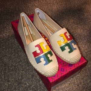 Tory Burch slip on shoes. 6